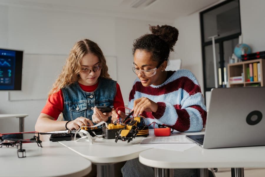 High school students building an electronics project